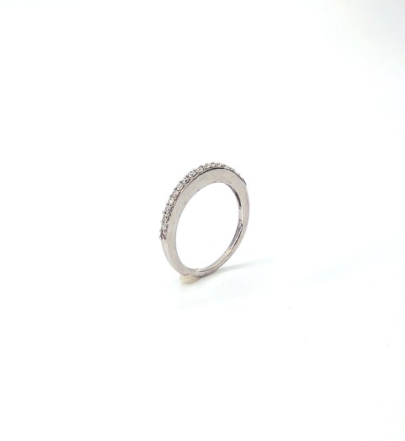 14 K White Gold Diamond Band / Ring featuring Shared Prong
