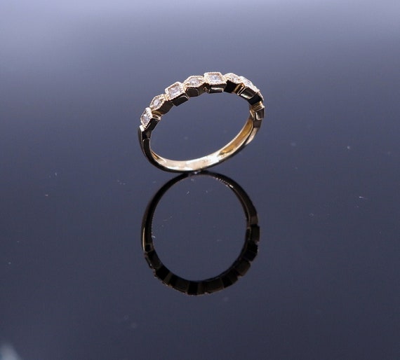 14 K Y Gold Fancy Band / Ring, Gold, 2.1 grams, TW of Diamonds, 0.24 CT