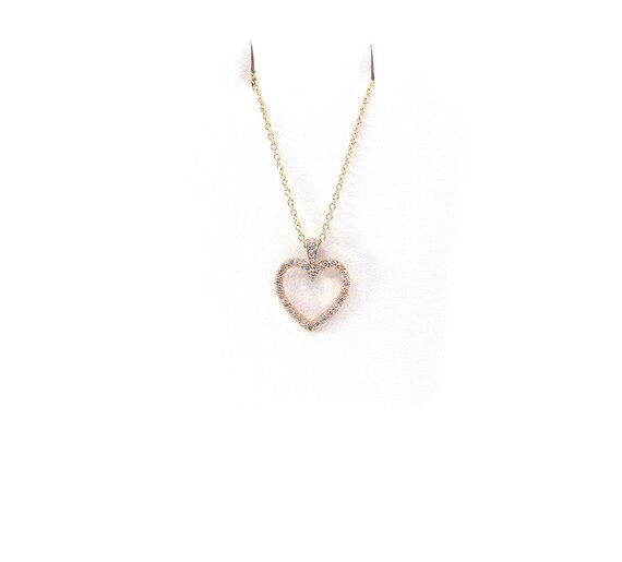 14 K Y Gold Diamond Heart Shaped Pendant, Gold, 2.7 grams, TW of diamonds, 0.38 CT