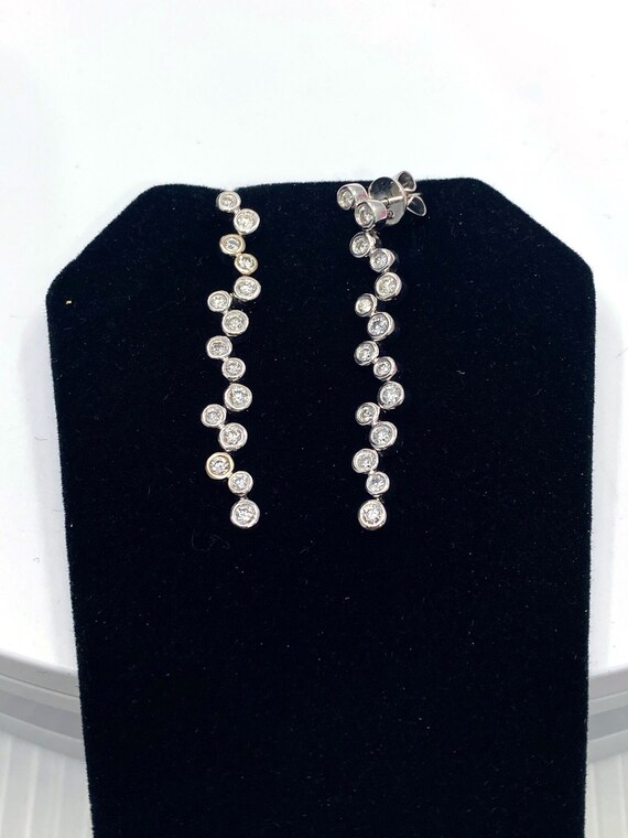 18 K White Gold Diamond Long Drop Dangling Earrings Featuring Cluster Round Shape Diamonds