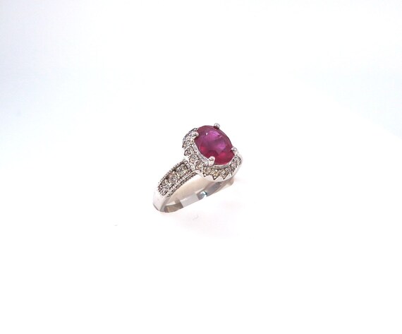 14 K White Gold Diamond Ruby Oval Shape Ring in One Row Halo