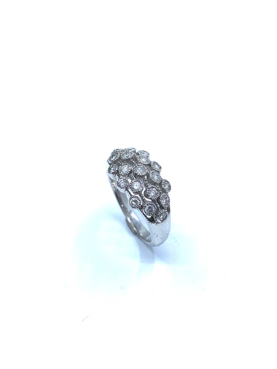 18 K W Gold Band Ring with Five Rows of Round Diamonds, Gold, 6 grams, TW of Diamonds, 0.72 CT