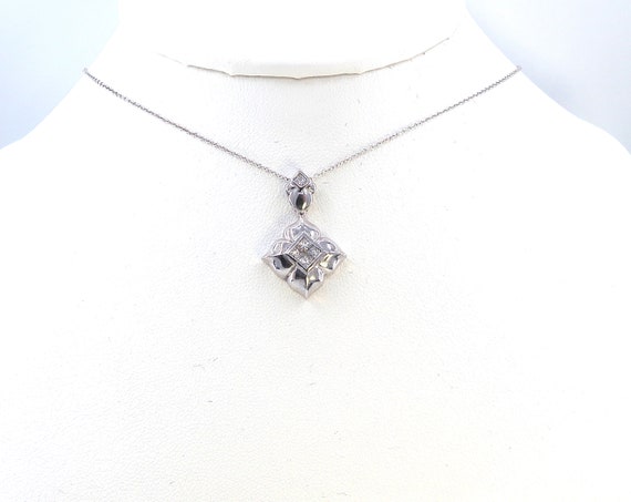 18 K W Gold Designer Slider Pendant w/ Chain included, Gold, 5.7 grams, TW of diamonds, 0.36 CT