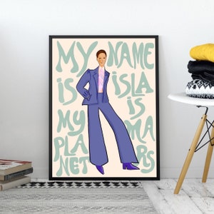 May include: A digital illustration of a person in a blue suit with the text "My name is Isla, my planet is Mars" in a light green font.