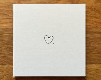 Heart - handmade wedding guest book with elegant linen cover and black embossed motif