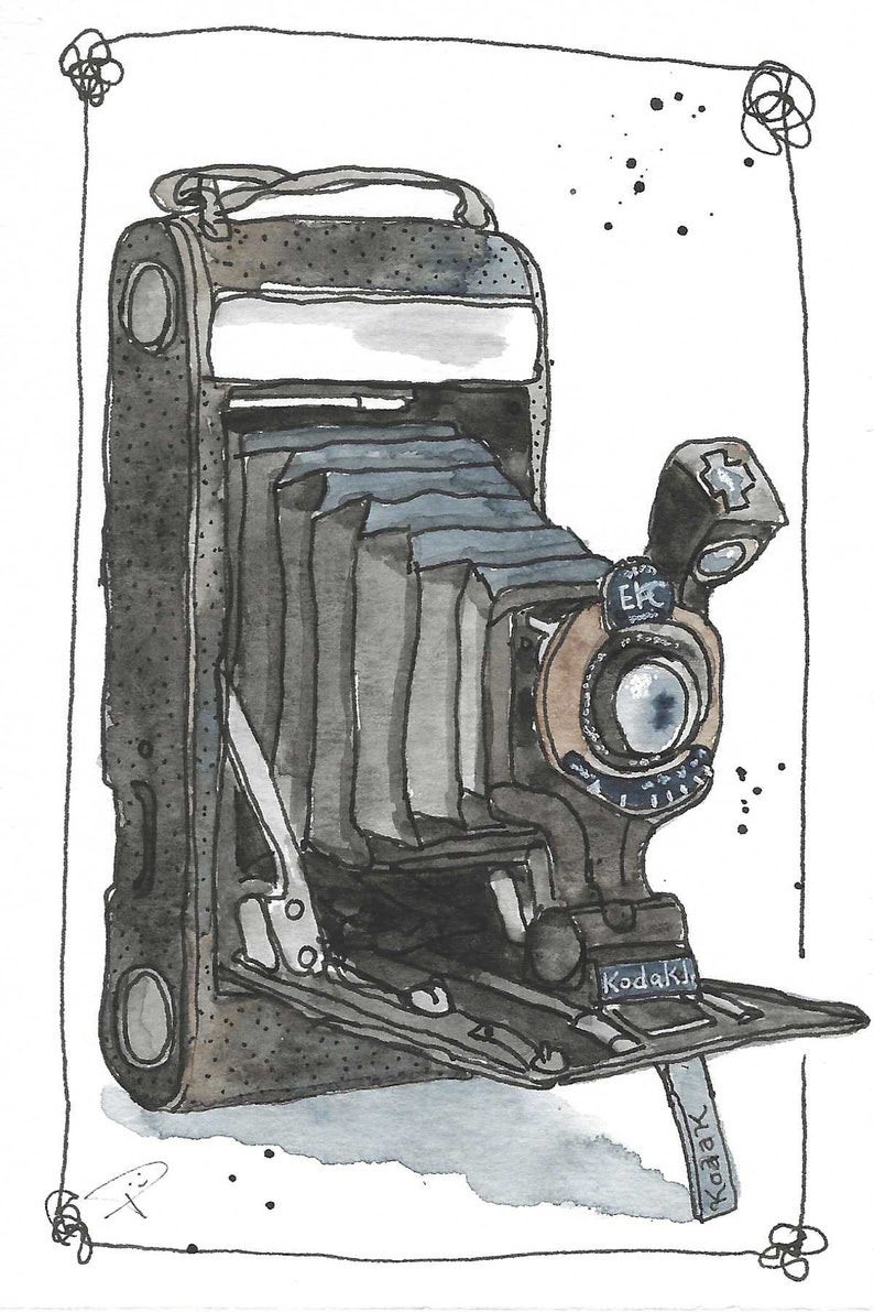 May include: Watercolor illustration of a vintage Kodak camera. The camera is primarily gray and black with a brown lens and a bellows design. The word "Kodak" is visible on the front. The image is framed with a black border.