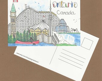May include: Watercolor postcard featuring Ontario, Canada landmarks. The illustration includes a roller coaster, CN Tower, and a red canoe. The word "Ontario" is written in colorful letters, and the Canadian flag is visible.