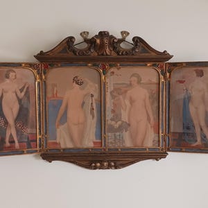 May include: A four-panel artwork featuring nude figures in various poses. The artwork is framed in a dark wood with ornate carvings. Each panel depicts a different scene, with soft colors and classical themes.