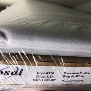 May include: A package of white, nonwoven fusible fabric, style #314, made of 100% polyester. The label reads "Bosal" and "Sewing/Tailoring". The fabric is light weight and originates from the USA. Ideal for sewing and tailoring projects.