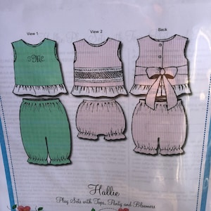 May include: A sewing pattern for a baby girl's outfit called "Hallie" with a pink gingham top, green pants, and a white ruffle. The pattern includes sizes 12, 18, and 24 months. The pattern is from Bonnie Blue Designs.