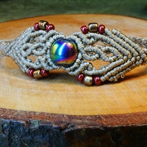 handmade macrame bracelet with rainbow hematite in blackgreenblue