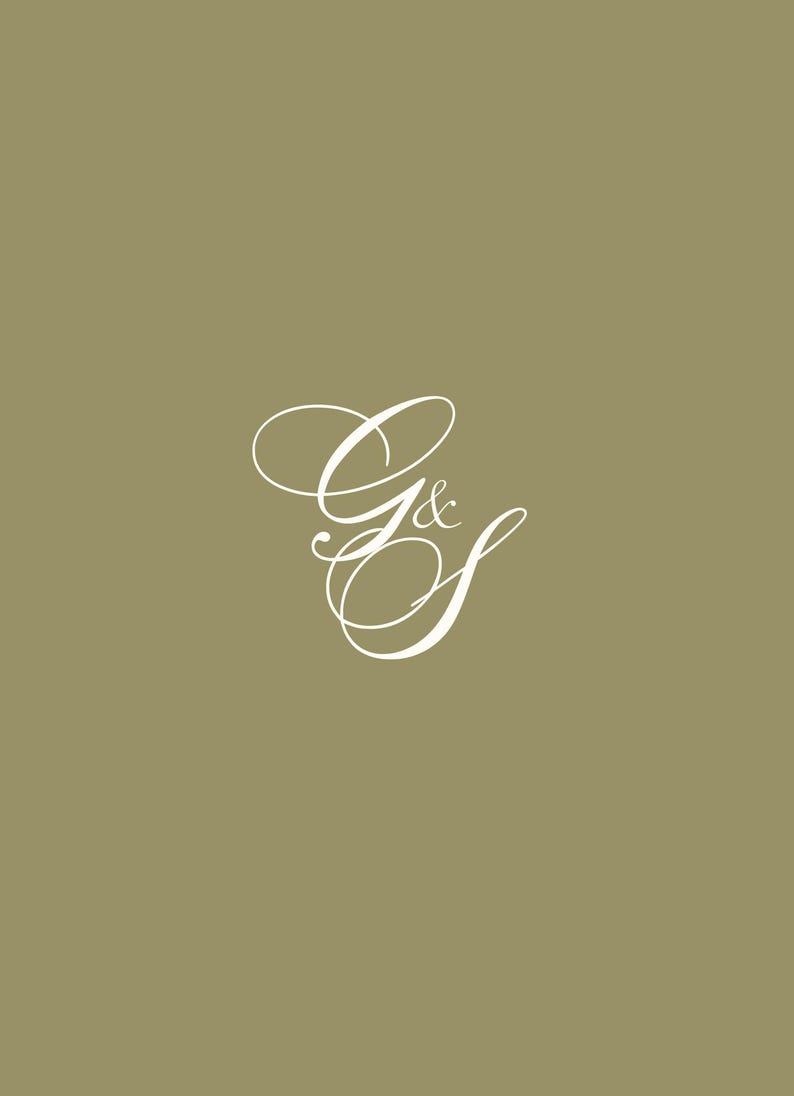 May include: A white cursive script monogram with the letters "G & S" on a light brown background.