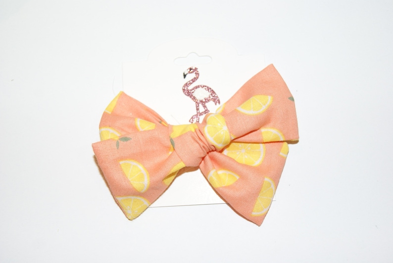 Coral lemon hand tied bow nylon headband or clip