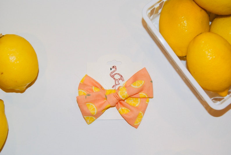 Coral lemon hand tied bow nylon headband or clip