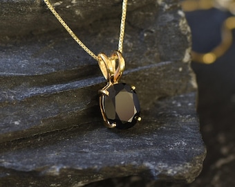 Collar de ónix dorado, colgante solitario ovalado, joyería minimalista de piedra negra.