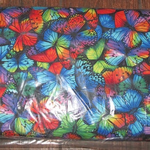 Katoenen stof met vlinderglitterprint: quiltmateriaal