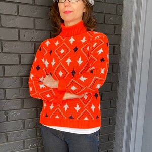 Retro jaren 70 coltrui, toffe kleuren en atomair ontwerp