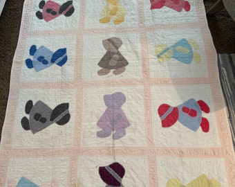 Vintage Sunbonnet Sue Patchwork Quilt 48X76 Classic Girl Pattern Each With A Different Color Framed in Pale Peach Minor Spots Stains