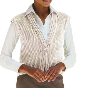 May include: A white knitted vest with a V-neck and a single button closure. The vest has a cable knit pattern and a fringed edge.