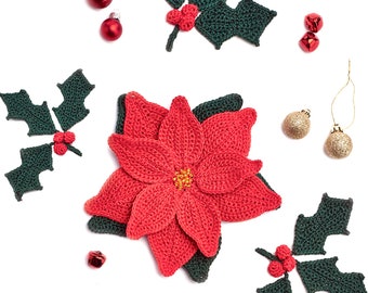 May include: A red crocheted poinsettia flower surrounded by green crocheted holly leaves and red and gold ornaments.