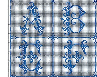 May include: A vintage cross-stitch pattern featuring the letters A through M in a blue, ornate font. The letters are displayed in a grid pattern on a white background. The design includes decorative flourishes and anchors.