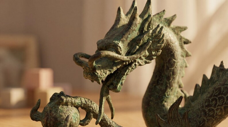 May include: A detailed bronze dragon sculpture with a textured surface. The dragon is depicted with an open mouth, sharp teeth, and intricate scales. The sculpture is a decorative item, possibly for home decor.