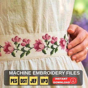 May include: A cream-colored dress with a floral embroidered belt featuring pink roses and green leaves. The text "MACHINE EMBROIDERY FILES" is displayed with file type abbreviations and an "INSTANT DOWNLOAD" button.