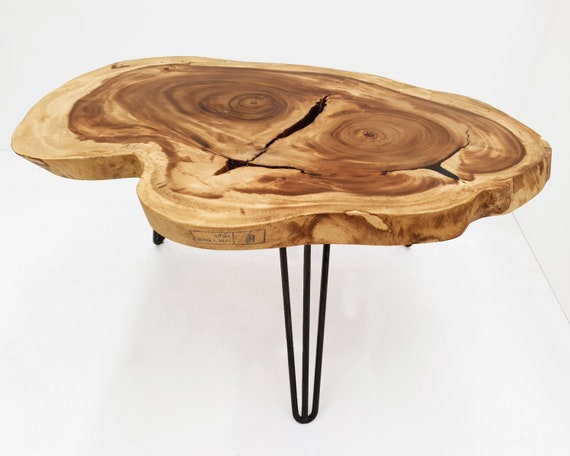 Irregular shaped wood coffee on sale table