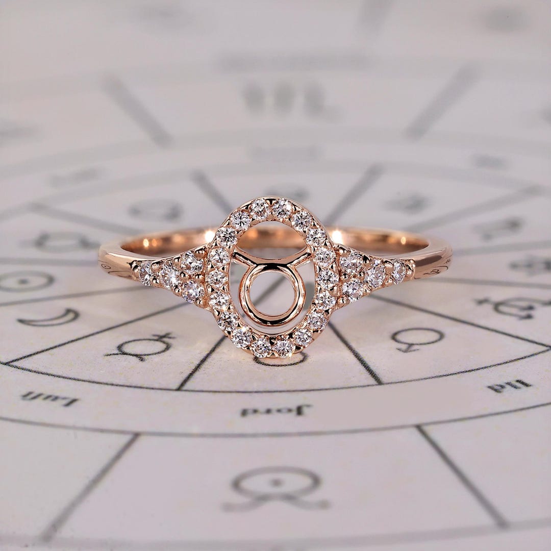 Taurus Ring With Round Cut Diamond Halo and Side Stone Design
