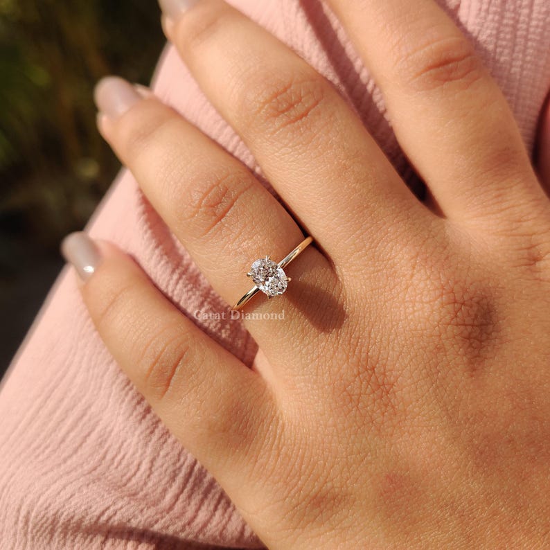 Elegant Oval Diamond Cut solitaire ring, perfect for engagements and proposals.