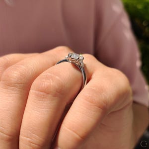 6 prong setting ring with lab grown marquise center diamond for secure fit.