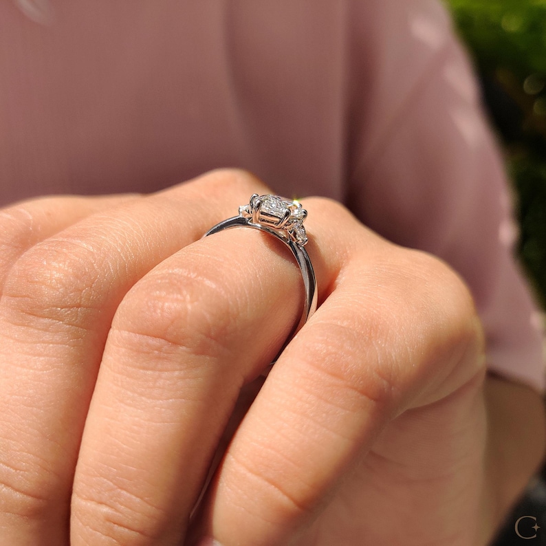 6 prong setting ring with lab grown marquise center diamond for secure fit.