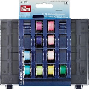 May include: A clear plastic bobbin box with a blue insert holding 10 colourful thread spools. The box is labelled "Bobbin box" and "32 sewing Machine bobbins". The box is designed to store sewing machine bobbins.