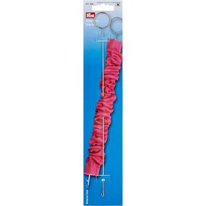 May include: A pink fabric covered tool with a metal hook and a metal ring at the top. The tool is labeled "Wunderhaft Long Stitch".