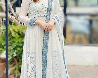 white cotton frock suit