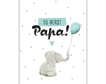 Könnte beinhalten: Eine weiße Karte mit schwarzen Punkten und dem Text "DU WIRST Papa!" in Schwarz. Ein blauer Ballon ist an einen grauen Elefanten gebunden, über dem Elefanten ein blaues Herz.
