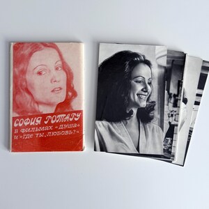 May include: A vintage book and several black and white photographs. The book has a red cover with a portrait and Cyrillic text. The photographs feature a woman smiling. The book's title is "СОФИЯ РОТАРУ" and the text below reads "в фильмах «душа» и «где ты, любовь?»".