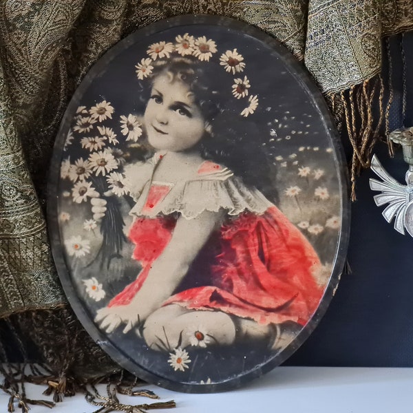 Antique image in oval frame, vintage photo decor, retro portrait of a girl with flowers, wall decor 1950s