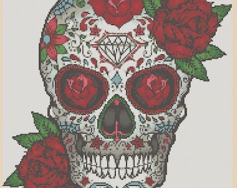 May include: A white sugar skull with red roses and intricate floral designs. The skull has a diamond on its forehead and red roses for eyes.