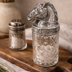 May include: A set of three ceramic mugs with a speckled, matte finish. The mugs are in shades of cream, light gray, and dark gray. Each mug has a simple, minimalist design, perfect for coffee or tea.