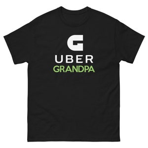 May include: Black t-shirt with a white Uber logo and the text "Uber Grandpa" in green.