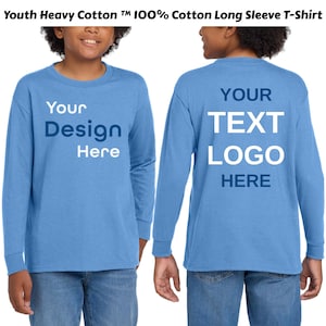 May include: Light blue long-sleeve youth t-shirt. The front of the shirt has the text "Your Design Here" in white. The back of the shirt has the text "Your Text Logo Here" in white. The shirt is made of heavy cotton.