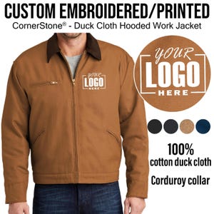 May include: A brown duck cloth hooded work jacket with a corduroy collar. The jacket has a zipper closure and two front pockets. The jacket is customizable with an embroidered or printed logo. The text "YOUR LOGO HERE" is displayed on the jacket.