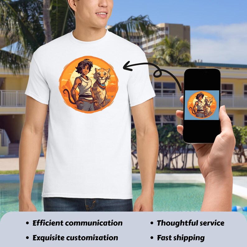 May include: White t-shirt featuring a circular graphic of a person and a tiger-like animal set against an orange sunset. The person is wearing a white tank top and blue pants. The animal has a blue collar. The image is on a smartphone.