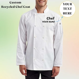 May include: A white chef coat with long sleeves and a double-breasted design. The coat features the text "Chef YOUR NAME" and "Custom Recycled Chef Coat". A pocket is visible on the left sleeve. The background is a gradient of yellow and green.