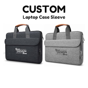 May include: Two laptop cases with zippered closures and handles. One case is black and the other is gray. Both cases have the text "Your Design Here" printed on them.