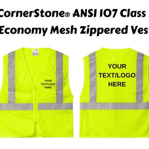 May include: A high-visibility yellow mesh zippered vest with reflective silver stripes. The vest has the text "YOUR TEXT/LOGO HERE" printed on the front and back. The text "CornerStone&reg; ANSI 107 Class 2 Economy Mesh Zippered Vest" is printed at the top.