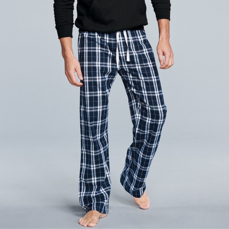 May include: Blue and white plaid pajama pants with a white drawstring.