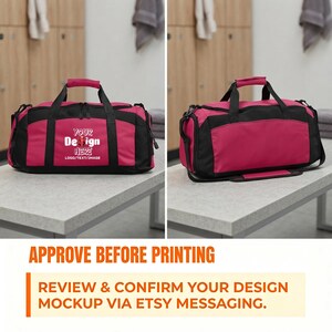 May include: A pink and black duffel bag featuring two top handles and a zippered main compartment. The front of the bag displays the white text "YOUR DESIGN HERE LOGO/TEXT/IMAGE". The bag is shown from two different angles, front and side view.