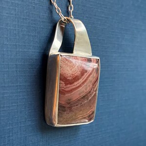 Asymmetrical Red Banded Jasper pendant set in Sterling SIlver